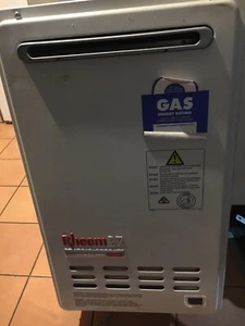 RHEEM 27 INSTANT HOT WATER SYSTEM-NATURAL GAS IN GOOD WORKING ORDER. - Picture 1 of 3