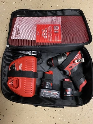 Milwaukee M12 1/2” Hammer Drill Batteries And Charger 3304-22 - Image 1 of 4