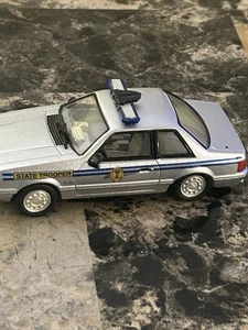 1999 White Rose Collection Maßstab 1:43 1991 Ford Mustang SC State Stopper Diecas - Bild 1 von 4