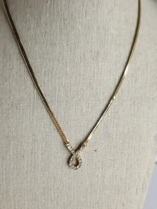 Collana infinito tono oro vintage catena spina di pesce strass anello pendente - Foto 1 di 8