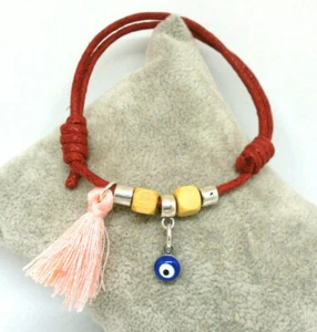 Bracelet " Eye Turkish " Charm Enamel And With Tassel Pink - Cord Red - Picture 1 of 3