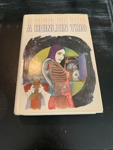 A Heinlein Trio By Robert A Heinlein  1957 Hardcover Book Club Edition - Imagen 1 de 12