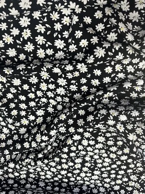 1 mtr black/white  floral daisy flower viscose dress fabric..58”wide (147cm) - Image 1 of 2