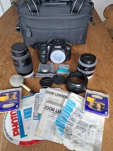 Cámara Minolta Dynax 500si SLR 35mm + Lentes, Estuche, Trípode, Filtros y Extras - Imagen 1 de 19