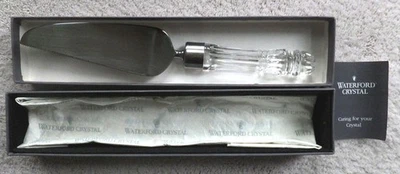 Servidor cortador de pasteles con mango de cristal Waterford hoja SS + caja de pañuelos y folleto Foto 1 de 4