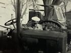 Man In Hat Looking At Engine Of Tractor Farm B&W Photograph 2.75 x 4
