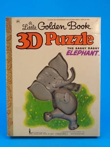 LIBROS DORADOS DE COLECCIÓN * EL ROMPECABEZAS 3D DEL ELEFANTE HOLGADO CAÍDO * LARAMI 1978 - Imagen 1 de 7