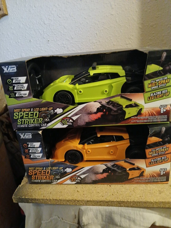 2 remote control cars for kids releases  mist from the rear - Image 1 of 4