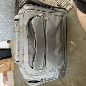 Silver Nylon Tumi Rolling Cary On Duffle Bag Luggage w/ Retractable Handle - Picture 1 of 15