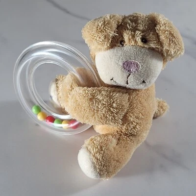 DE COLECCIÓN NIÑOS II SUNNY EL CACHORRO PERRO DOUNUT MANO SONAJERO PELUCHE CIRCA 2002 Foto 1 de 4