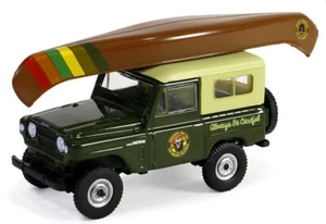 1980 Nissan Patrol with Canoe on Roof Smokey Bear Greenlight 1:64 - Picture 1 of 2