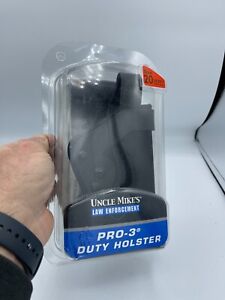 BRAND NEW!!!...Uncle Mike's Pro-3 Duty Holster Size 20 RH 3520-1 NEW