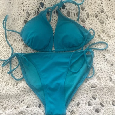 Conjunto de sutiã e biquíni OP tamanho júnior azul-petróleo com laços laterais, tamanho L Junior - Imagem 1 de 4