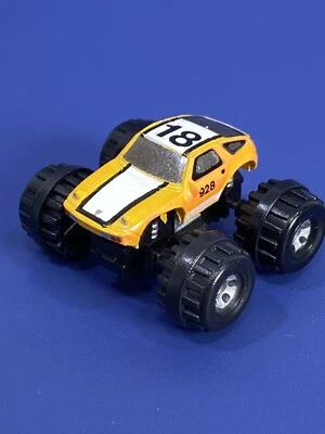 Vtg 1987 Galoob Micro Machines Porsche 928 Monster Truck 18 Toy Vehicle Orange - Image 1 of 4