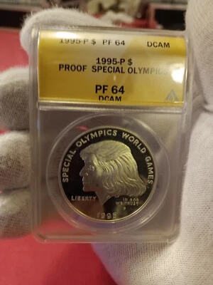 1995-P ANACS Proof Special Olympics Commemorative Silver Dollar $1 - Image 1 of 2
