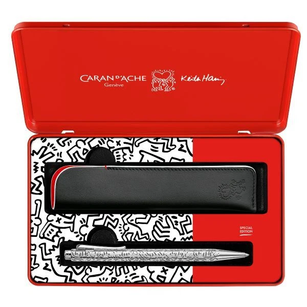 Juego de bolígrafo y estuche de cuero Caran d'Ache Ecridor Keith Haring Navidad 2023 Foto 1 de 4
