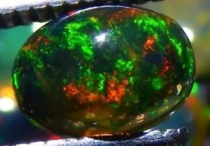 ETHIOPIAN BLACK FIRE OPAL 8 x 6 MM OVAL CABOCHON CALIBRATED  - Picture 1 of 1