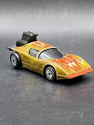 Coche de juguete coleccionable Hot Wheels Flame Runner dorado Malasia de colección Foto 1 de 4