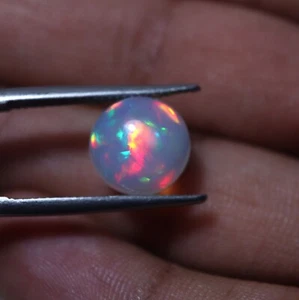 Cabujón de ópalo blanco etíope fuego llamativo arco iris natural AAA redondo de 11 mm - Imagen 1 de 11