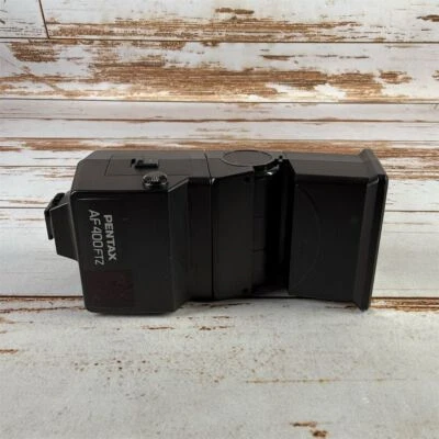 Pentax AF400FTZ Shoe Mount Flash for Film Cameras TTL Swivel Tilt - Image 1 of 4