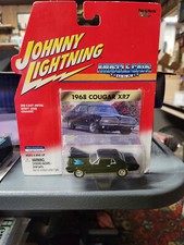 Johnny Lightning (2000) Muscle Cars USA, 1968 Cougar XR7, black NIP