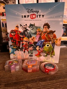 13 Disney Infinity Power Discs and collector book 1.0 - Picture 1 of 7