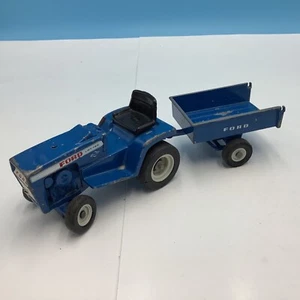 ERTL 1/12th Blue Ford LGT 145 Hydrostatic Lawn Garden Tractor Dump Trailer 814 - Picture 1 of 11