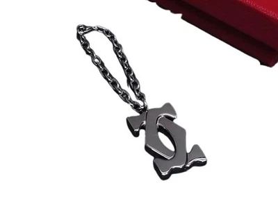 Charm borsa portachiavi Cartier 2C - metallo argento unisex ottime condizioni - Immagine 1 di 3