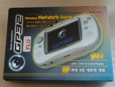 Gamepark gp32 white [box + 32mb cartridge + usb cable] [] tbe