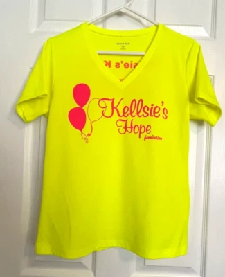 Usada en Excelente Condición Kellsie's Hope Base Para Mujer Cuello en V Manga Corta Camisa para Correr Amarilla M Foto 1 de 4