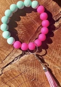 Braccialetto con perline in silicone portachiavi fatto a mano rosa teal - Foto 1 di 1