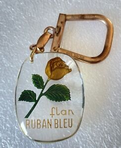 Porte clés BOURBON  rare ROSE 🥀 OR   FLAN RUBAN BLEU .