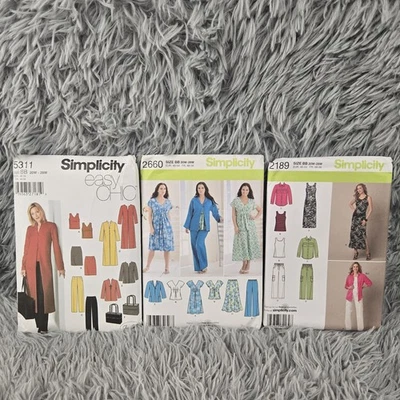 Lot Of 3 Simplicity 5311,2660,2189 Tops,Pants, Dress BB 20W-28W Sewing Pattern - Image 1 of 3