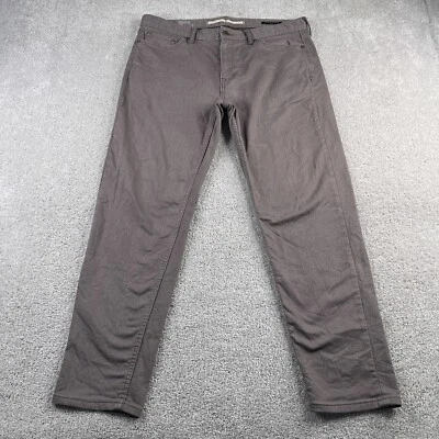 Pantalones de mezclilla Banana Republic para hombre 36x32 (se adapta a 36x29) marrón de viaje calce atlético Foto 1 de 4