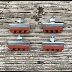 BRAKE SHOE PADS FOR SCHWINN CALIPER BIKE BRAKES LONGLAST VINTAGE RED NOS FOUR - Picture 1 of 5