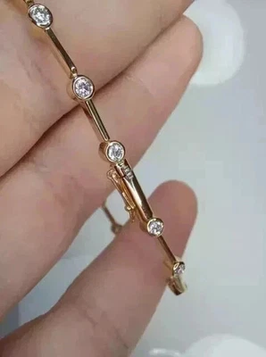 Impresionante brazalete de tenis enchapado en oro amarillo de 14 k con diamantes simulados de corte redondo de 5 quilates Foto 1 de 4