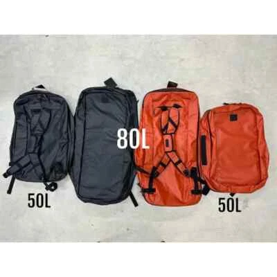 Bolsa de viaje SIMMS Tailwind 50L negra/simms naranja Foto 1 de 2