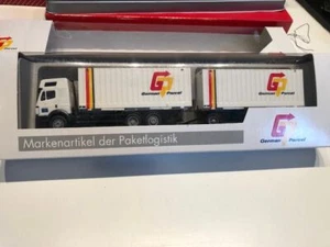 AMW Werbemodell MB 2544 Wechselbrücken Sattelzug German Parcel mit OVP 1:87 HO - Bild 1 von 3