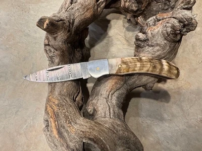 Big Damascus folding blade knife w/ Rams horn handle - Image 1 of 4
