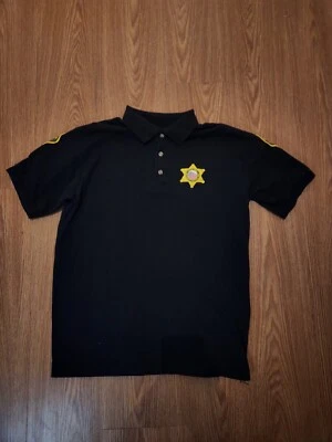 Polo de seguridad vintage Foto 1 de 2