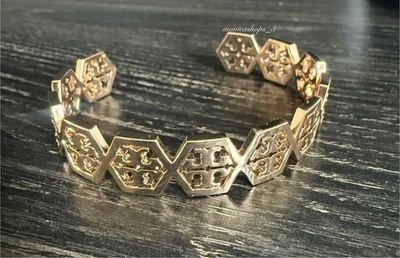 Punho com logotipo hexagonal Tory Burch novo com etiquetas em ouro amarelo MSRP $128 - Imagem 1 de 2