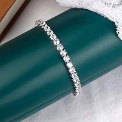 Pulsera de tenis de 7 pulgadas con circonita cúbica brillante transparente de 4 mm de plata de ley 925 Foto 1 de 4