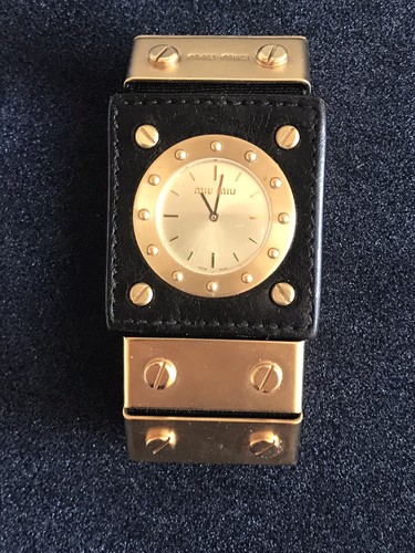 Autentico Orologio Bracciale MIU MIU. Custodia in Pelle Nera e Bracciale Metallo Oro
