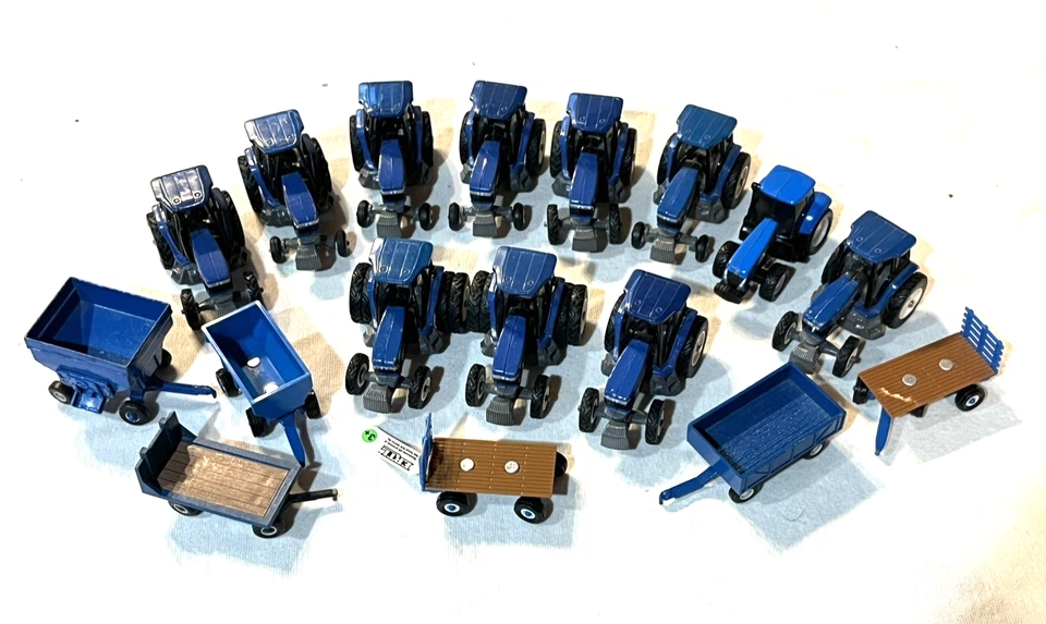 ERTL 1/64 New Holland Lot of 17 Tractors & Implements - Image 1 of 4