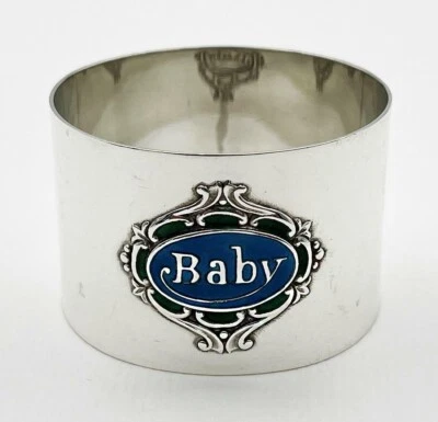Antiguo anillo servilletero inglés de plata de ley y esmalte "Bebé" de fecha 1906 Foto 1 de 4