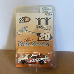 TONY STEWART #20 HOME DEPOT HABITAT FOR HUMANITY 1999 ACTION 1:64 ROOKIE STRIPES - Bild 1 von 4