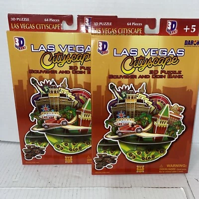 2 ea Las Vegas Cityscape 64 Piece 3D Cityscape Puzzle and Coin Bank New - Image 1 of 4