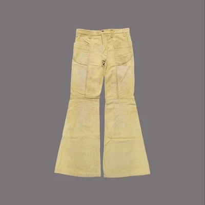 Pantalones de mezclilla vintage de pana con fondo de campana de los años 60 amarillo crema Woodstock 30 Foto 1 de 4