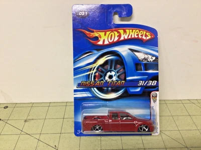 Camión Nissan Titan 2006 primeras ediciones color arándano Hot Wheels Foto 1 de 4