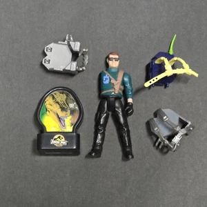Vintage Jurassic Park Dinosaurier Stempel Denis Nedry Figur Pack Ellie Sattler Rucksack - Bild 1 von 11